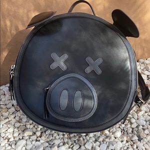 black pig backpack